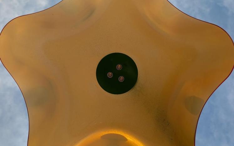 Orange-colored spray feature at the Bondurant Splash Pad