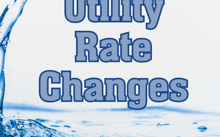 Flowing water with text "Utility Rate Changes" in bold, blue lettering