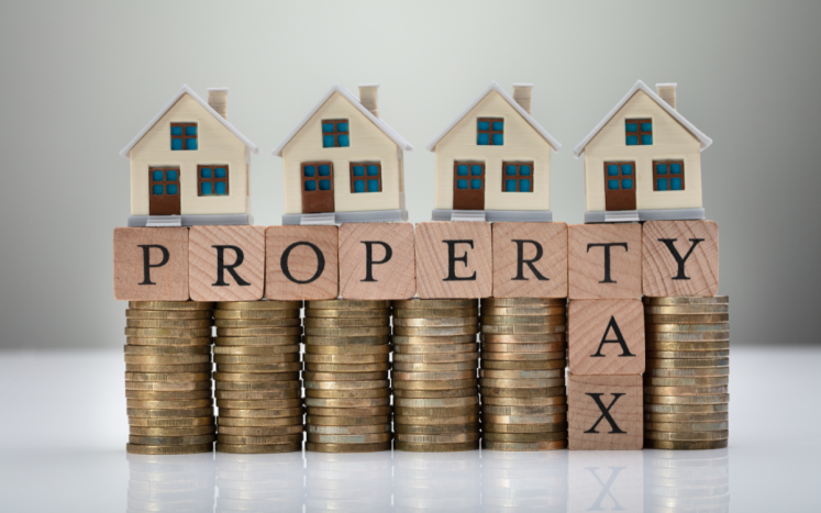 Image of houses and coins